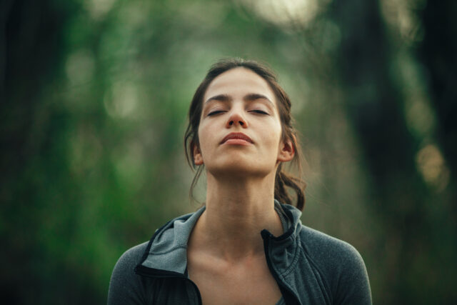 Young,Beautiful,Woman,Exercise,In,The,Forest