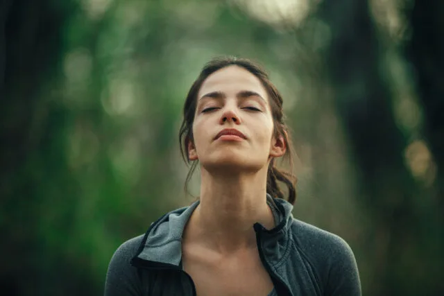 Young,Beautiful,Woman,Exercise,In,The,Forest